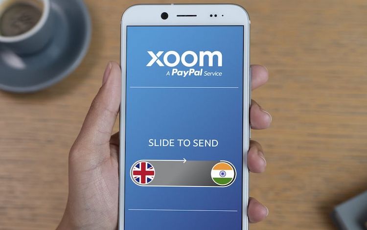 Handy mit Xoom-Transferservice von PayPal