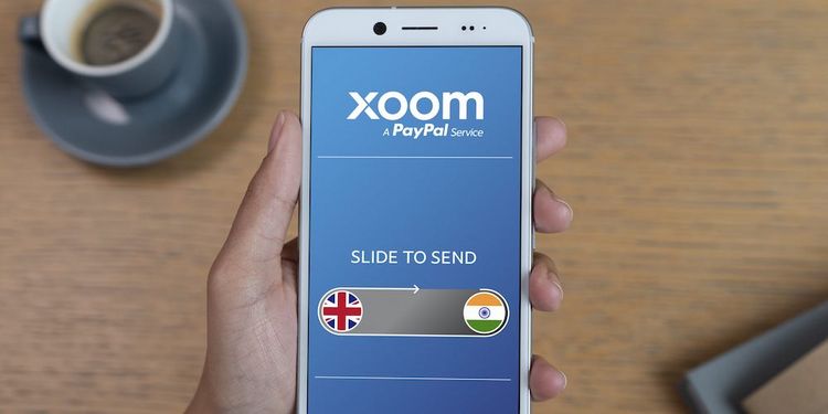 Handy mit Xoom-Transferservice von PayPal